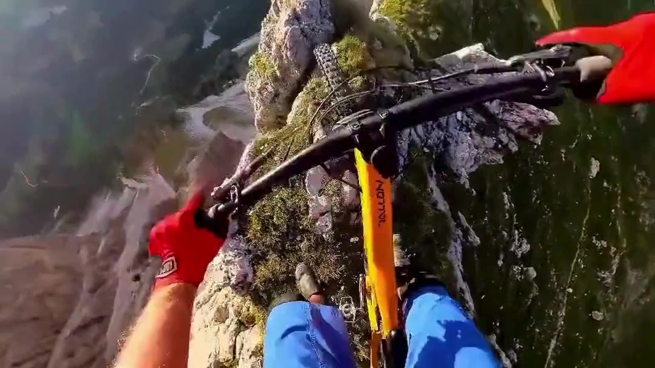 Edge of Adventure: Cycling on the Cliff! 🚴‍♂️🏞️🌄🌟👀😱