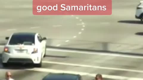 Street cameras showed good Samaritans stopping a car in a busy intersection