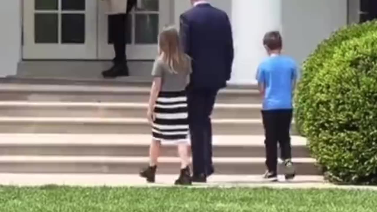 Watch! Pedojoe disappear from view into the White House with two young kids...