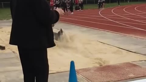 Guy Trips in Sand Pit While Attempting to Perform Long Jump