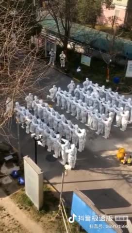 Chinese Stormtroopers Dance During Morning Call Before Going Door-to-Door to Perform COVID Tests