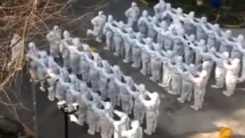 Chinese Stormtroopers Dance During Morning Call Before Going Door-to-Door to Perform COVID Tests