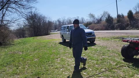 FOUR-WHEELER PULLS SOFA FROM DUMPING GROUND