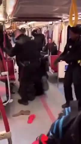 Toronto Police officers were seen dragging and brutally kicking a man on the TTC.
