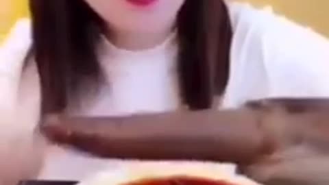 What is she eating? Can anyone tell? She has never eaten before but I am very fond of food.
