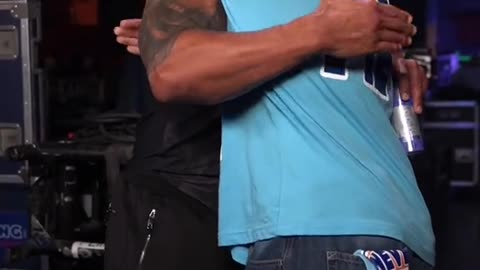 The Rock Hugs John Cena