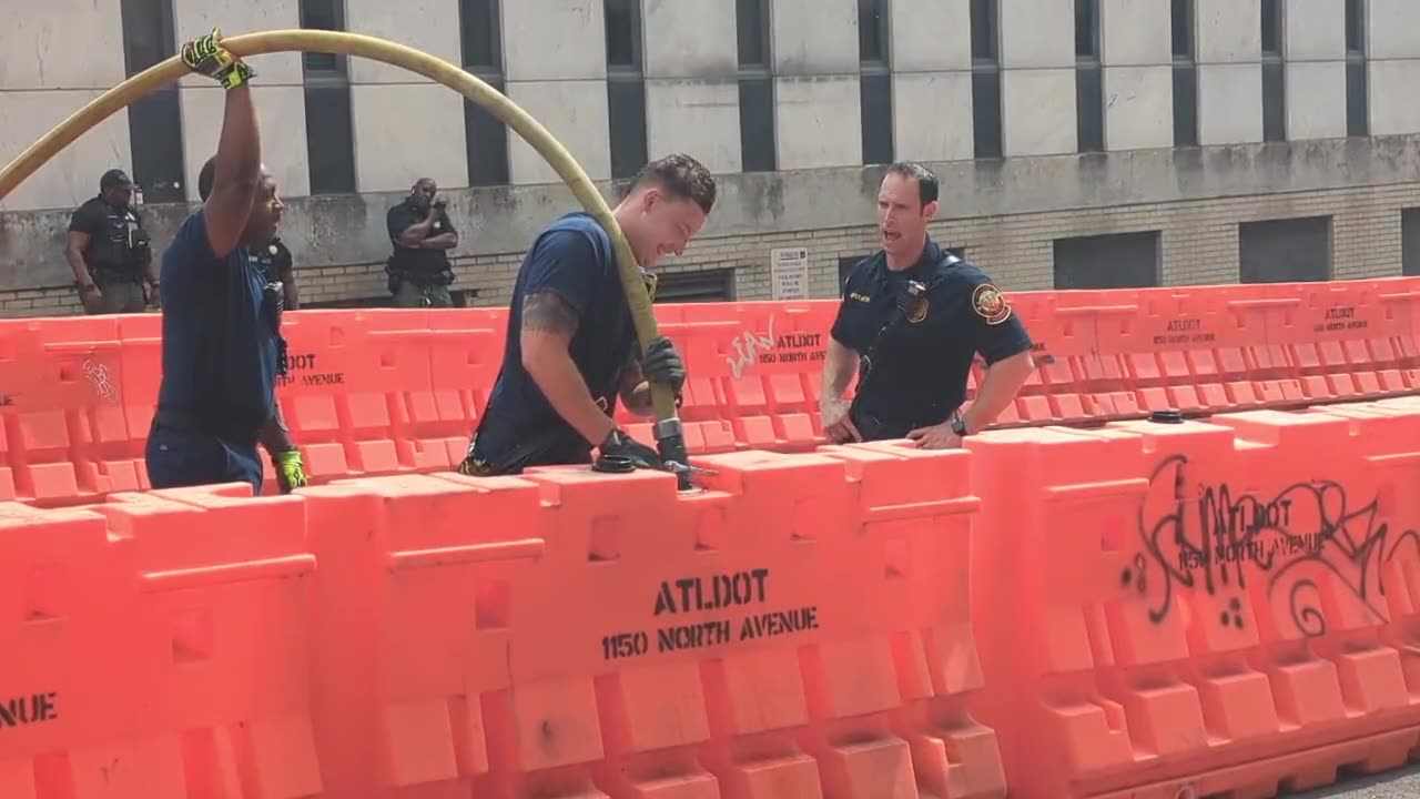 Meanwhile at the Fulton County Courthouse in Atlanta — the barricades now have their own barricades