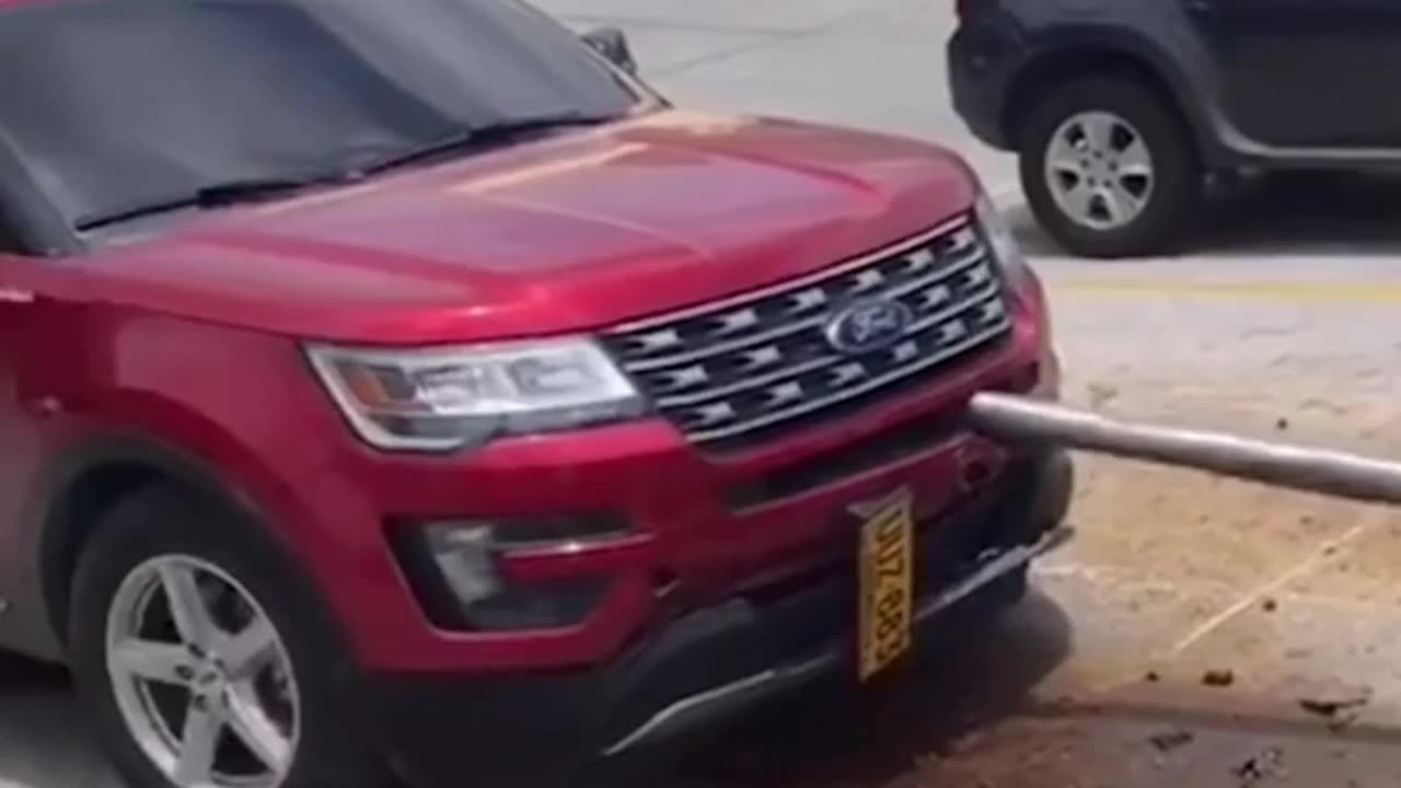 drilling machine goes off course and ends up drilling into a car.