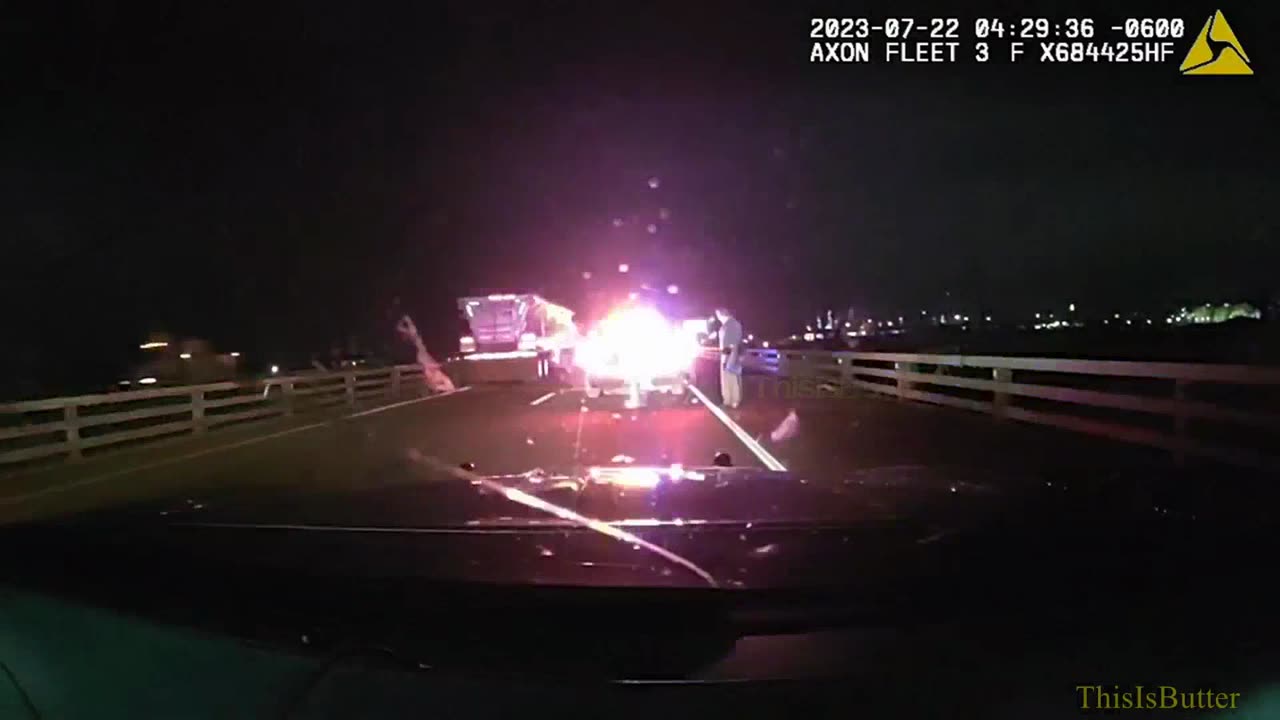 Dash cam shows trooper falling over 30ft elevated roadway to river bank while trying to escape crash