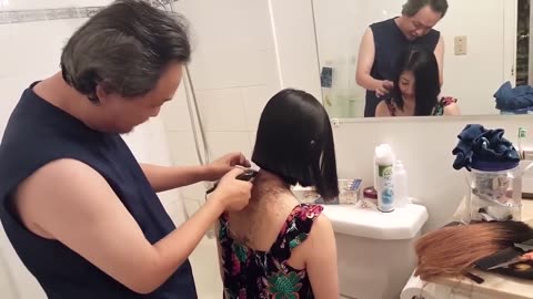 Beautiful girl hair cut in salon