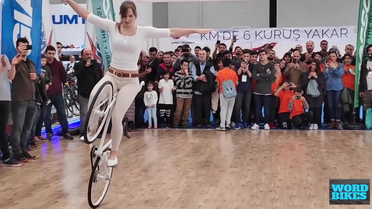 Girl Biker Performs