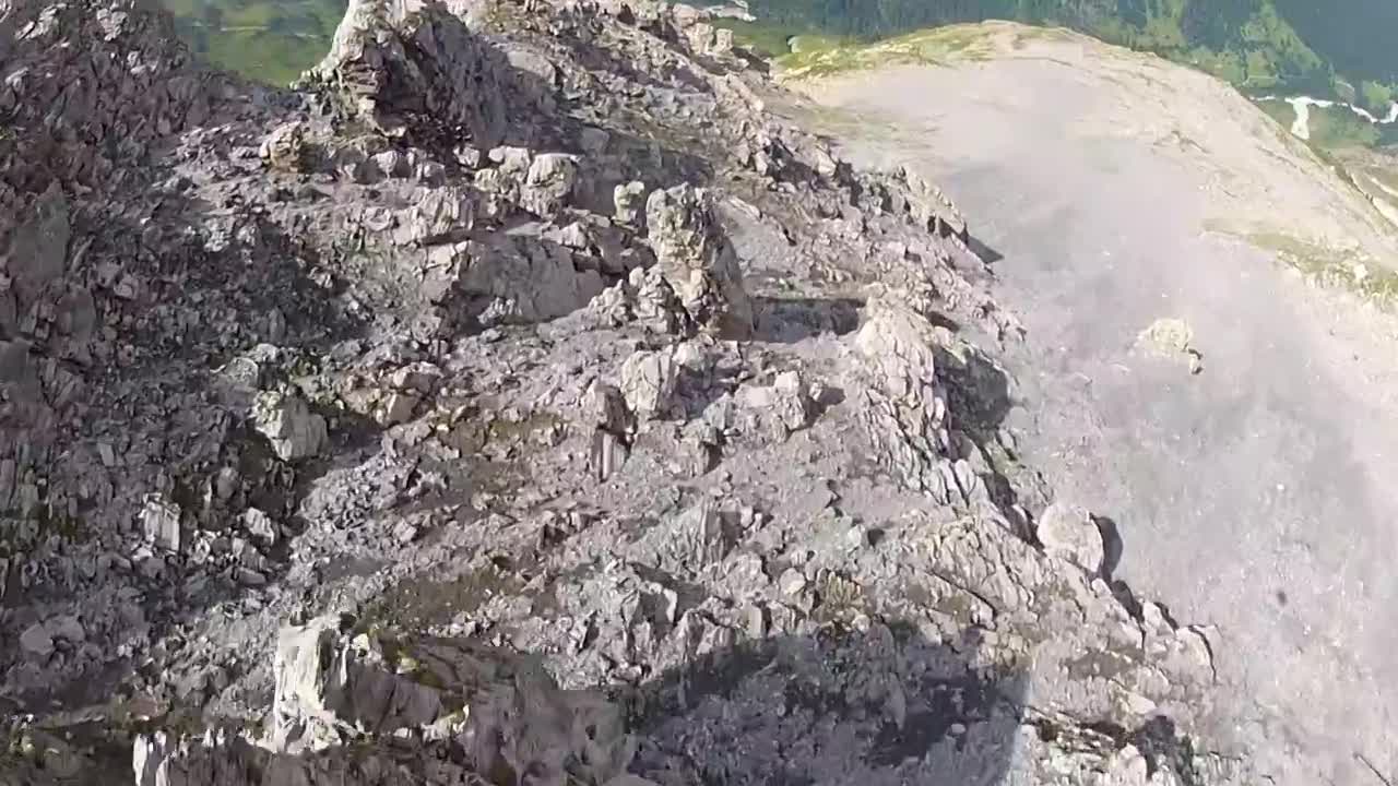 GoPro: Wingsuit Flight Through 2 Meter Cave - Uli Emanuele