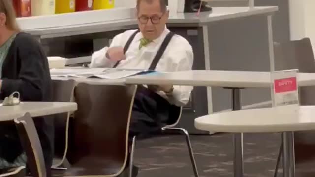 7/29/21 Rep Jerry Nader in the capital cafeteria reading the paper