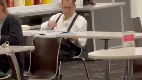 7/29/21 Rep Jerry Nader in the capital cafeteria reading the paper