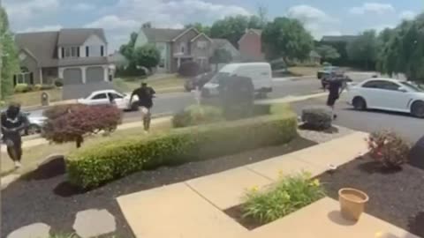 Two in a race to steal a FedEx package fight, seconds after the package was dropped off..