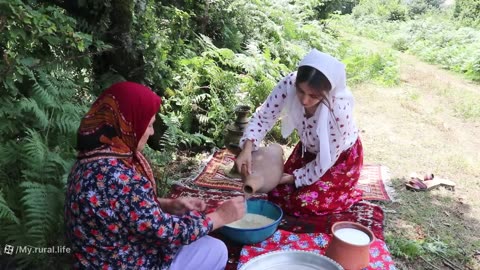 Cooking salmon with rice milk in the nature of the village