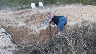 Digging the compost pit