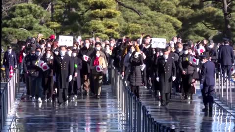 Japan's emperor greets the public for New Year's