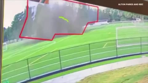 Part of a football field sinks 9 meters