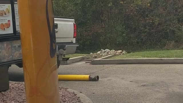Truck in Taco Bell Drive-Through Takes Out Pole