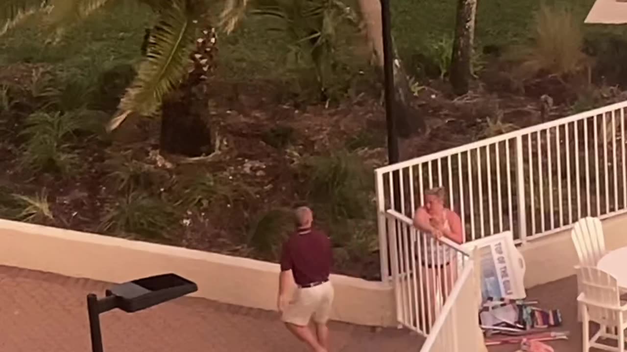 Woman Struggles With Pool Gate