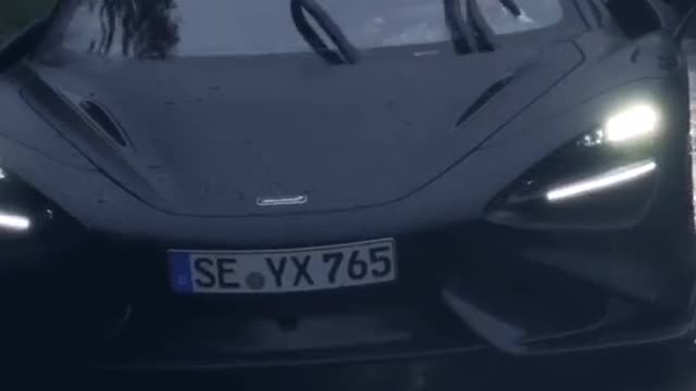 So handsome! Black samurai driving in the rain.