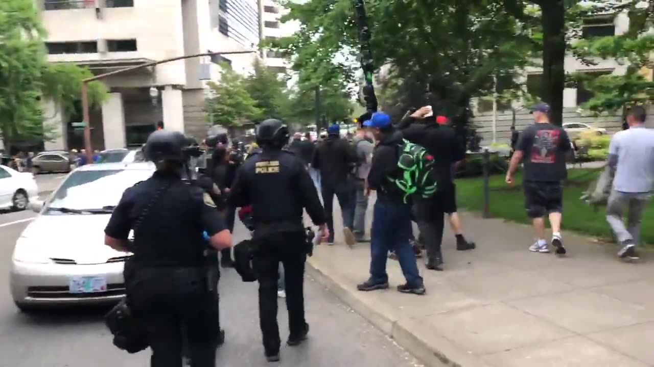 June 3 2018 Portland 1.4 Police blocking the groups, Antifa throwing fireworks