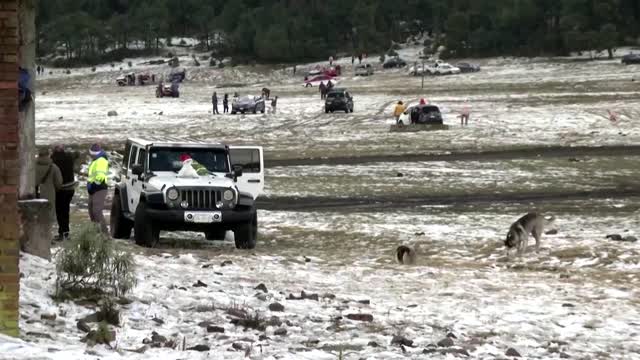 Mexico City residents surprised but excited by snow