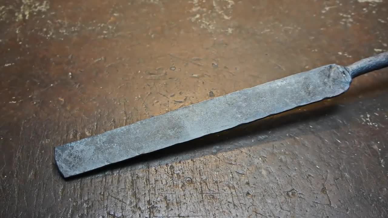 Damascus steel from two tape measures and 100 blades of stationery knives