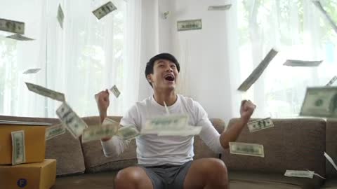 Slow Motion Portrait Of Very Happy Successful Cheering Man Throwing Money Up In The Air