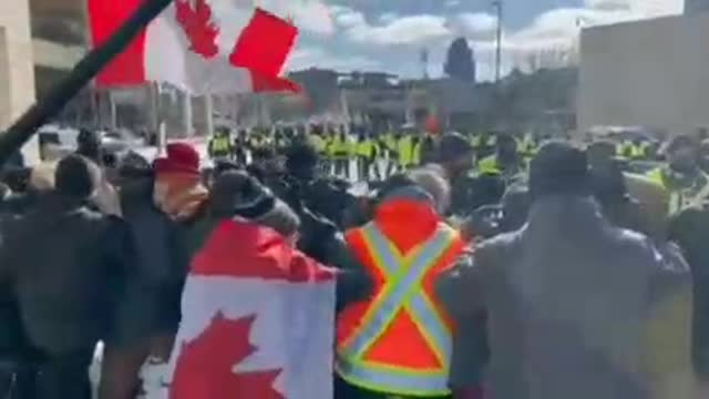 Freedom Convoy Ottawa - Protesters trying to hold the line yet heavily outnumbered by Trudeau's goons