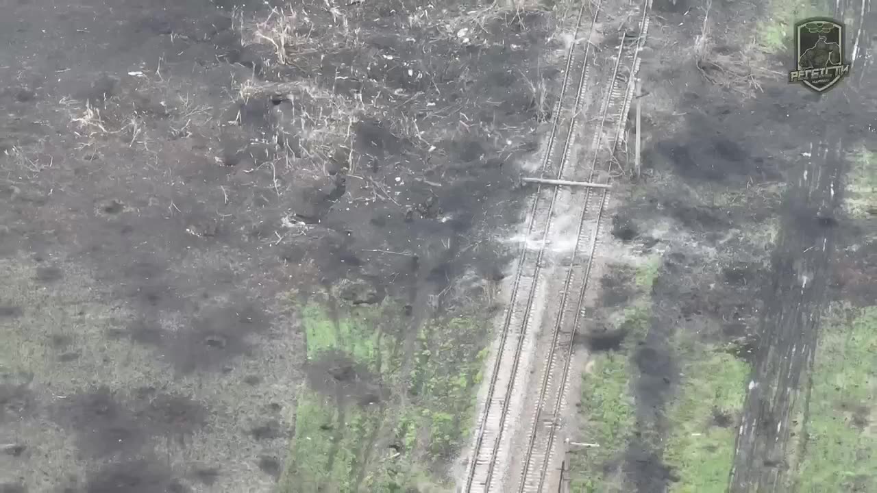 Russians Take Direct Hit On Side of Rail Bridge