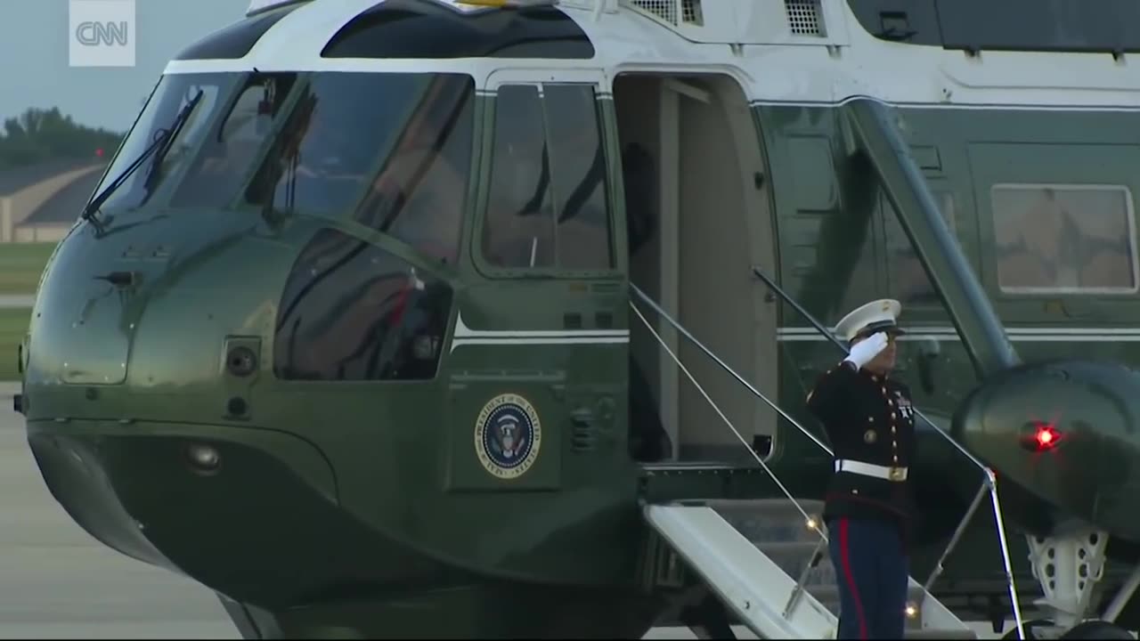 Trump stops to retrieve Marine's Hat