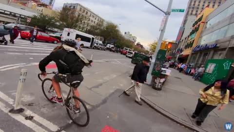 Bike Messenger Riding Fast and Fluid Through NYC Traffic