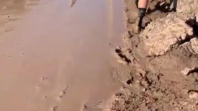 Bicyclists Find Themselves in Muddy Situation