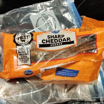 Eating Kroger Sharp Cheddar Cheese, Dbn, MI, 9/20/23