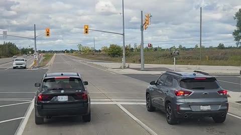 Car Uses Left Turn Lanes To Cut Traffic