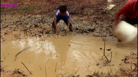 Best Hand Fishing | Amazing Man & Boy Catching Big Catfish - by Hand |in Mud Water - At The Canal