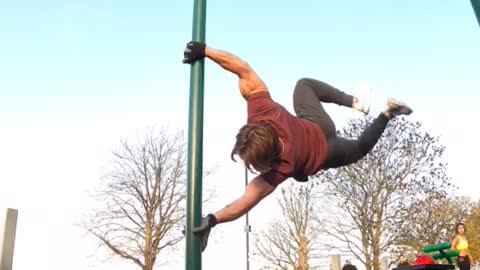 Human flag into handstand