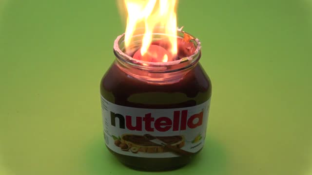 EXPERIMENT Glowing 1000 degree METAL BALL vs NUTELLA