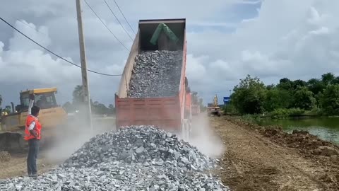 New bulldozer spreading gravel processing features building road foundation-11