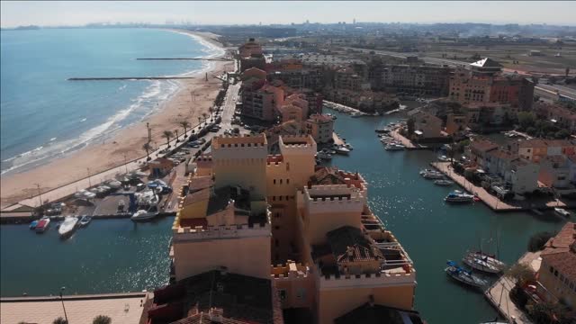 drone footage of beautiful saplaya port in valencia