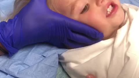 2 year old Kinley getting stitches for the first time!