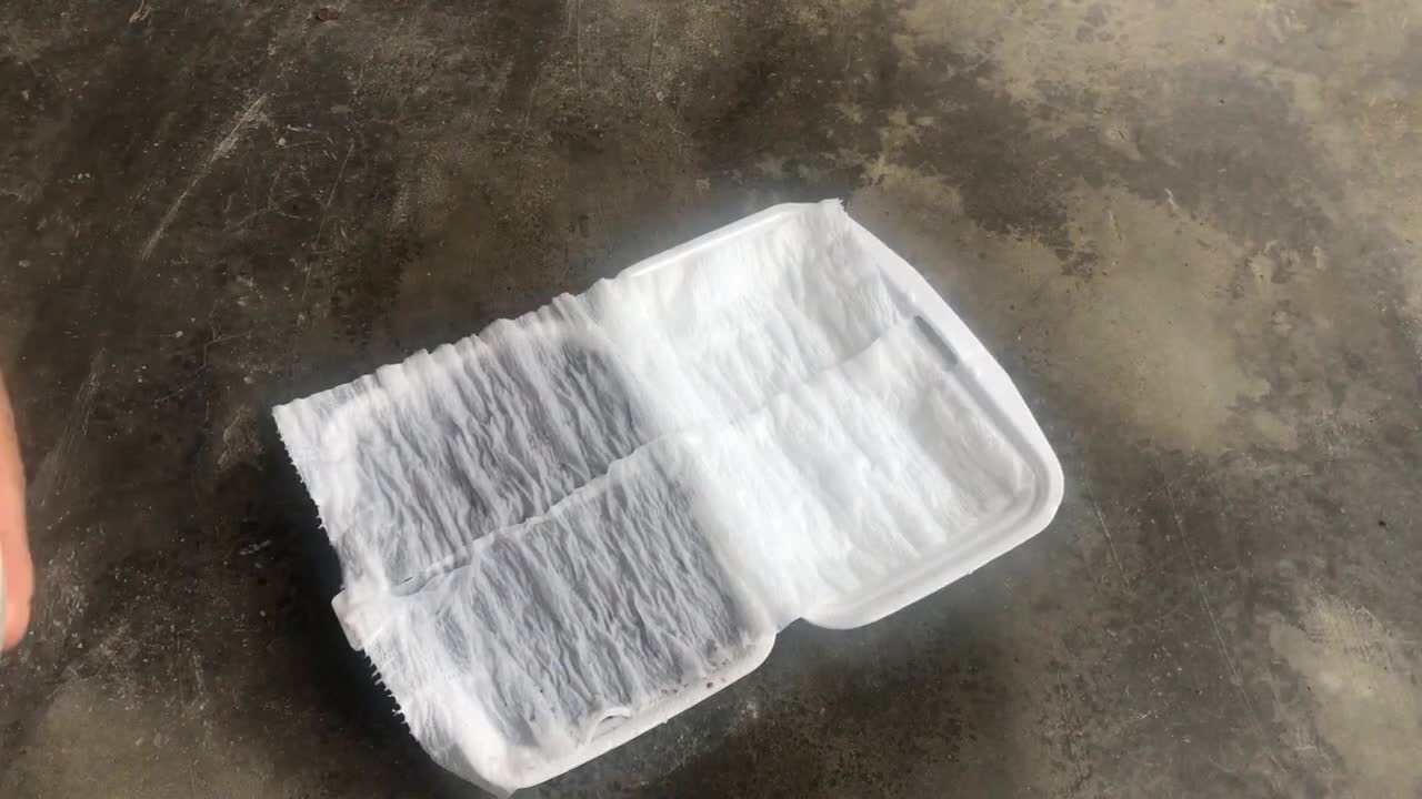 Spray the paper with water