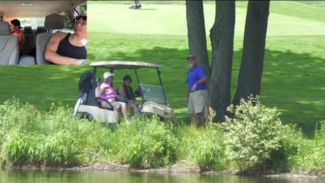 Pretending to look for my golf ball in a lake