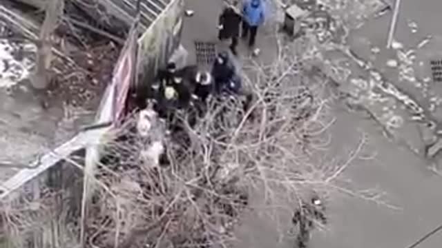 Protesters beat up security officials