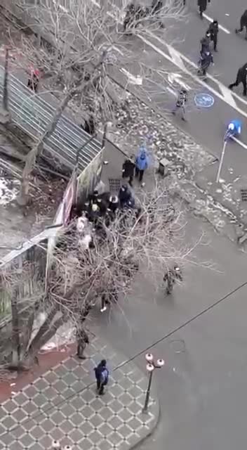 Protesters beat up security officials