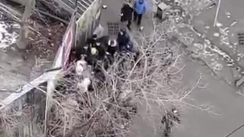 Protesters beat up security officials