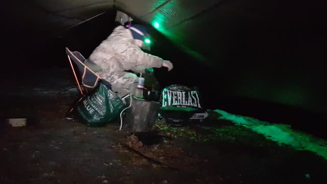 Making a coffee under a tarp . 15th Dec 2022