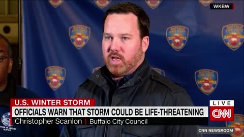 Woman tries to walk in deep snow after massive storm hits New York